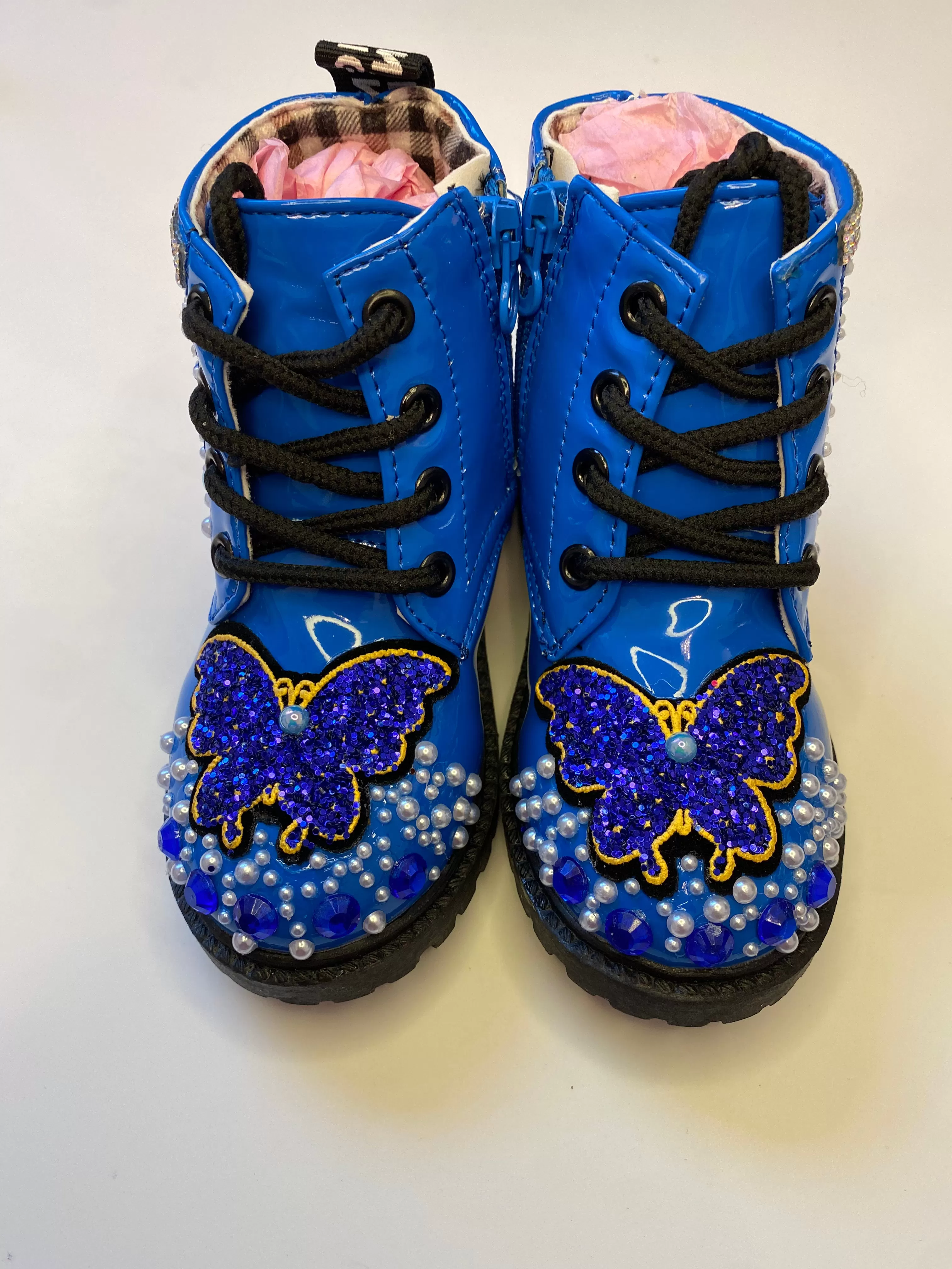 THE BLUE BUTTERFLY ON BLUE BOOTS