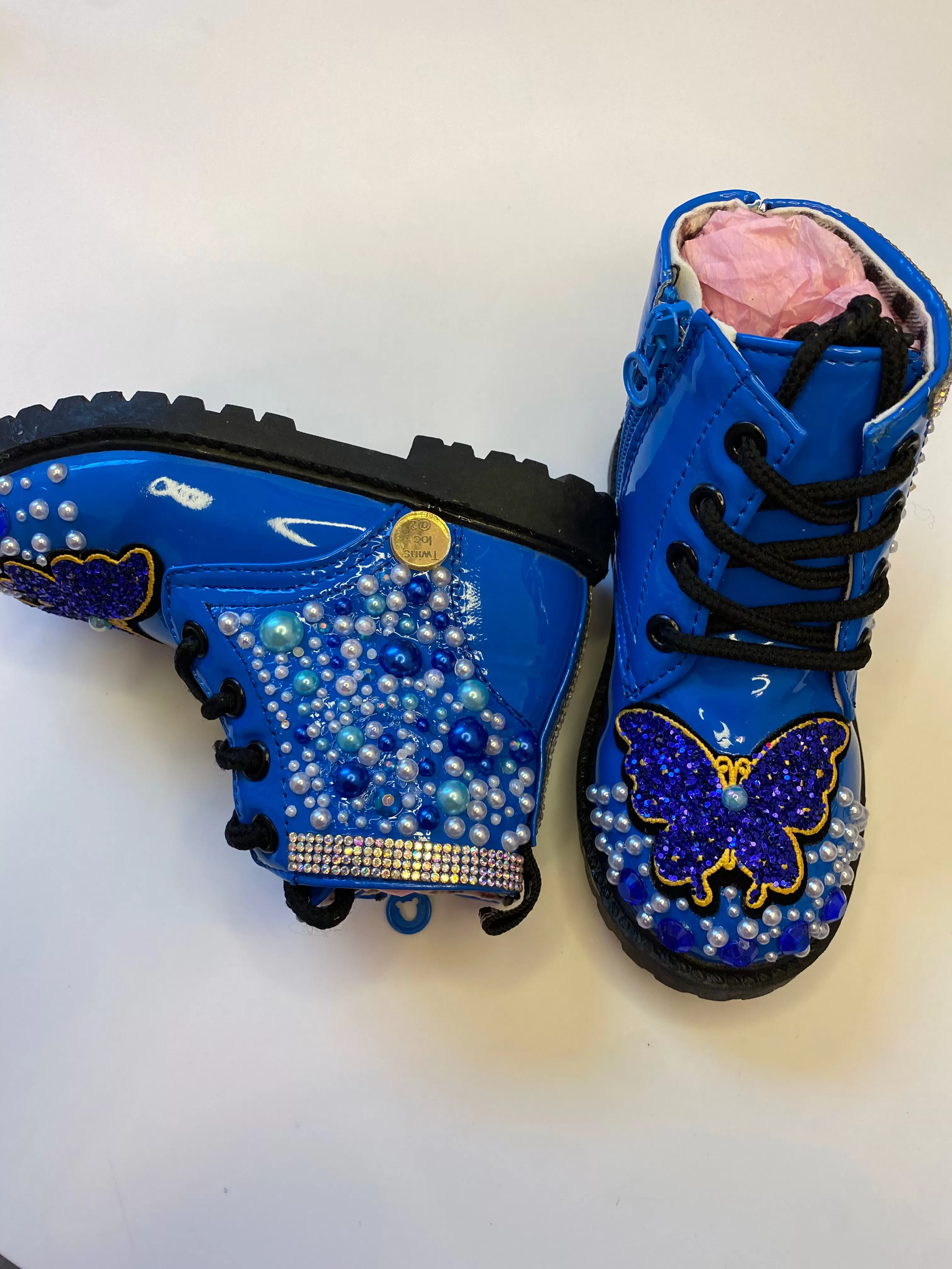 THE BLUE BUTTERFLY ON BLUE BOOTS